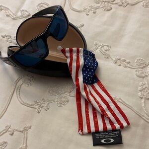 Oakley Sunglasses with Black Frame and Blue Lenses